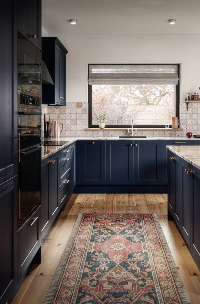Mirano Ink medium rail shaker kitchen door in deep ink blue with textured woodgrain finish.