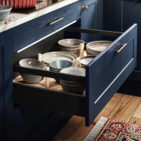 Kitchen drawer in blue shaker kitchen complete with peg board and lighting